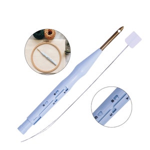 May include: A blue plastic embroidery needle threader with a metal hook and a sliding gauge marked with letters A, B, C, and D. The threader is shown next to a separate metal needle.