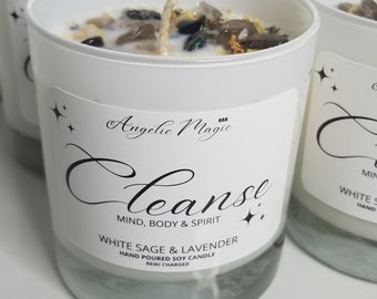 May include: White soy candle with crystals and a white label that reads "Angelic Magic Cleanse Mind, Body & Spirit White Sage & Lavender Hand Poured Soy Candle Reiki Charged"
