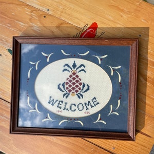 Vintage crewel pineapple welcome sign