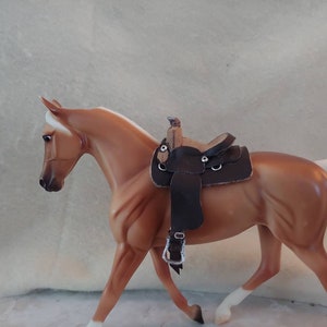 Classic 1:12 scale breyer western saddle. (Horse not included.)