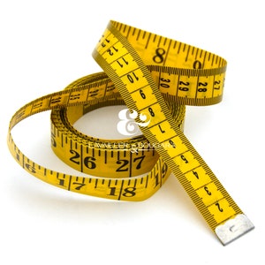 May include: A yellow measuring tape with black numbers, rolled up and ready to use. The tape is marked in inches.
