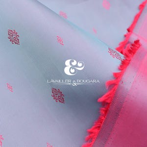 May include: A set of three ceramic mugs with a speckled, matte finish. The mugs are in shades of cream, light gray, and dark gray. Each mug has a simple, minimalist design and a rounded handle.