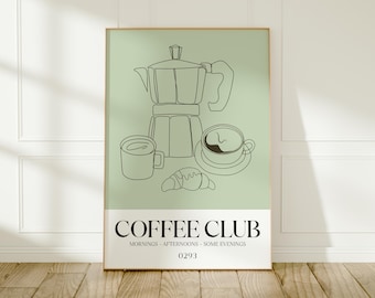 May include: A framed art print with a minimalist line drawing of coffee items. The image includes a coffee maker, two coffee cups, a croissant, and the words "COFFEE CLUB" with additional text. The background is a soft green.