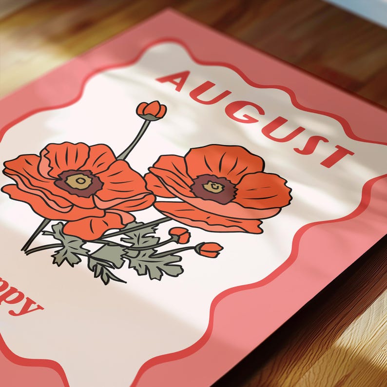 May include: A pink and white August calendar page featuring two orange poppy flowers with green leaves. The word "AUGUST" is printed in red at the top of the page. The page has a decorative pink border.