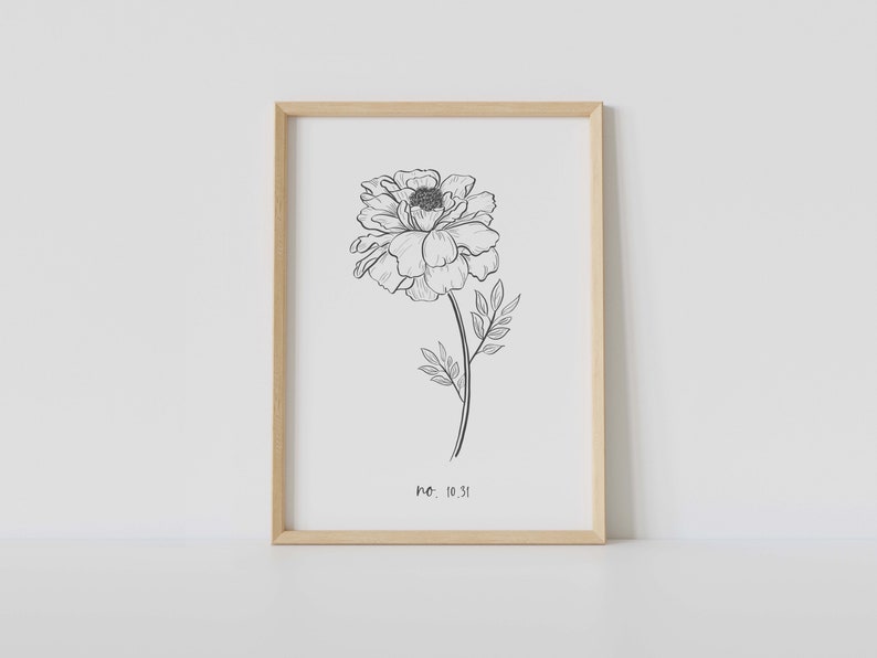 May include: A framed black and white botanical print featuring a detailed illustration of a peony flower. The artwork includes the stem, leaves, and the text "no. 10.31" at the bottom. The frame is made of light-colored wood.