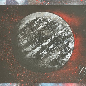 Black and White Planet with Red Stars and Shine