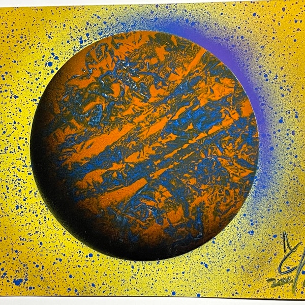 Blue and orange planet with yellow background and grape and blue stars and shine