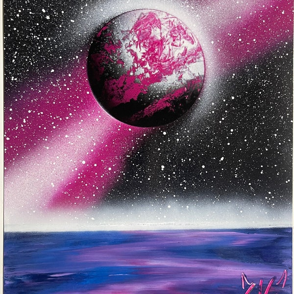 Magenta moon over water