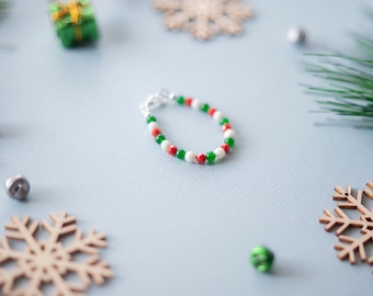 Pulsera de cuentas con motivos navideños para bebés y niños.
