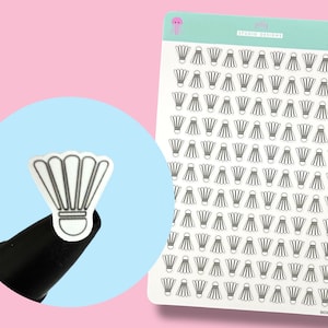 May include: A sheet of white stickers featuring a repeating pattern of badminton shuttlecocks. The stickers are black and white, with a detailed design. The image also shows a single sticker on a black object, and the text "elly studio designs".