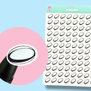 May include: A sheet of stickers featuring a repeating pattern of black and white oval shapes, resembling rugby balls. The stickers are on a white background with a light blue and pink backdrop. The sticker sheet has a light green header with the text "jelly STUDIO DESIGNS".