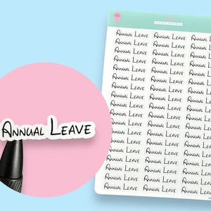 May include: A sheet of white sticker paper with the words "ANNUAL LEAVE" repeated multiple times in black cursive writing.