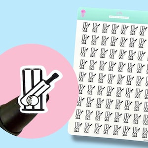 May include: Sheet of cricket-themed stickers featuring a black and white illustration of cricket equipment. The stickers include a cricket bat, ball, and wickets. The stickers are on a white background with a light blue background.