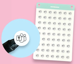 May include: A sheet of white sticker paper with 64 black and white Microsoft Teams logo stickers. The stickers are in a circle shape and feature a stylized icon of three people and the letter "T" in a square.