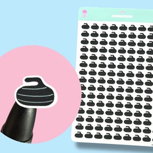 May include: Sheet of curling stone stickers. Each sticker is a black curling stone with white stripes. The sheet has a light blue background with a pink circle on the left. The stickers are on a white background with a light green header.