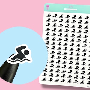 May include: A sheet of stickers featuring a swimmer icon in black and white. The stickers are arranged in rows and columns on a white background. The top of the sheet has the text "Jelly Studio Designs" and a pink jellyfish graphic.