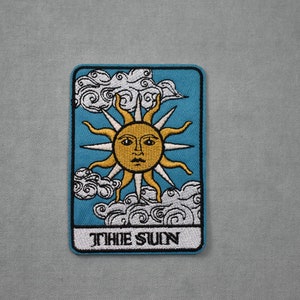 The sun iron-on patch, embroidered sun badge