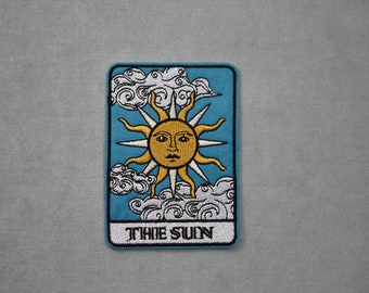 The sun iron-on patch, embroidered sun badge