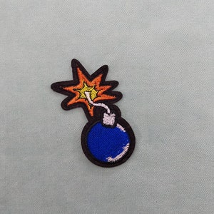 The bomb embroidered patch, iron-on badge