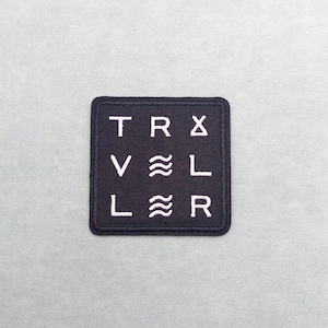 Embroidered iron-on traveler patch