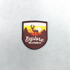 Ontdek wildernisthema's, strijk- of naaipatches en personaliseer je kleding en accessoires.