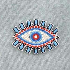 Strijkbaar ooglapje met ontwerpen, geborduurd embleem