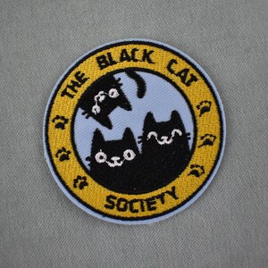 Black cat society badge, iron-on patch embroidered on iron or sewing, customize clothing and accessories