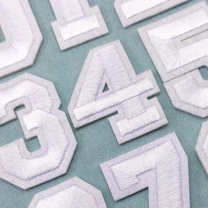 White number patches, embroidered iron-on number patches, for customizing clothes and accessories