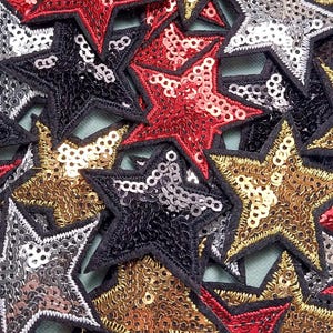Set of 3 gold glitter iron-on star patches, patches to be applied with an iron