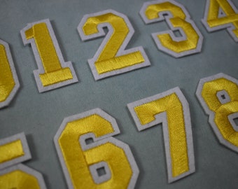 Yellow number patches, iron-on embroidered number patches, to customize clothing and accessories