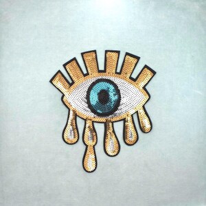 幸運を呼ぶ大きなゴールドのグリッターアイアイロンパッチ（23cm/25.5cm）