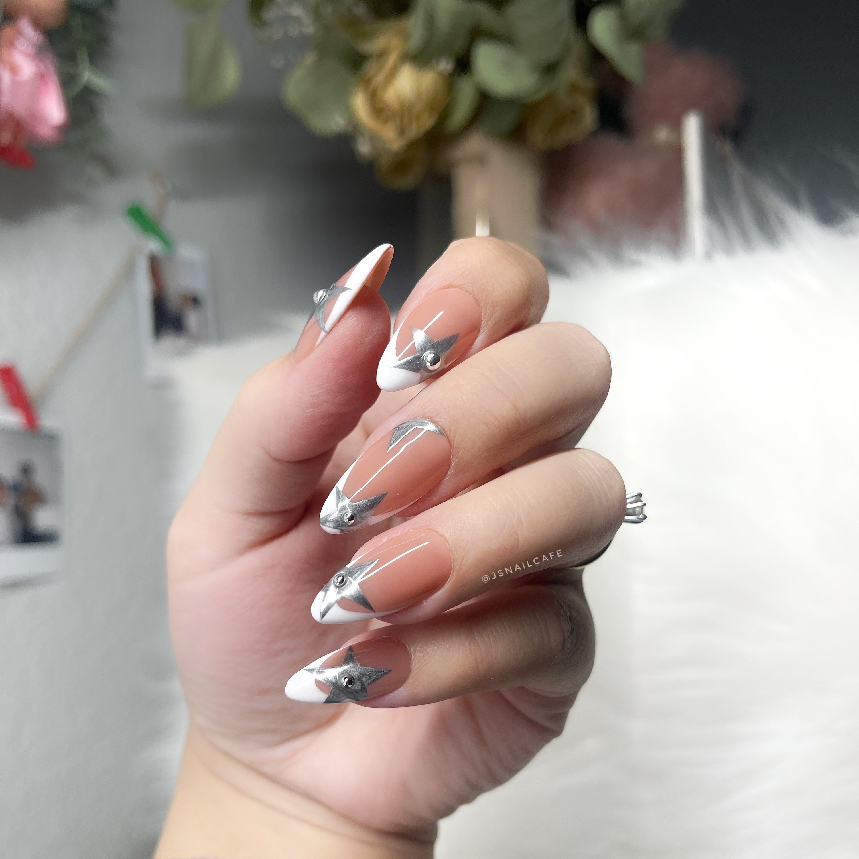 Starry White‑Tipped Nail Design