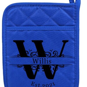 May include: Blue quilted hot pad with a black letter W and the text "Willis Est. 2021" in a decorative font.