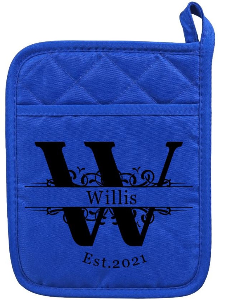 May include: Blue quilted hot pad with a black letter W and the text "Willis Est. 2021" in a decorative font.