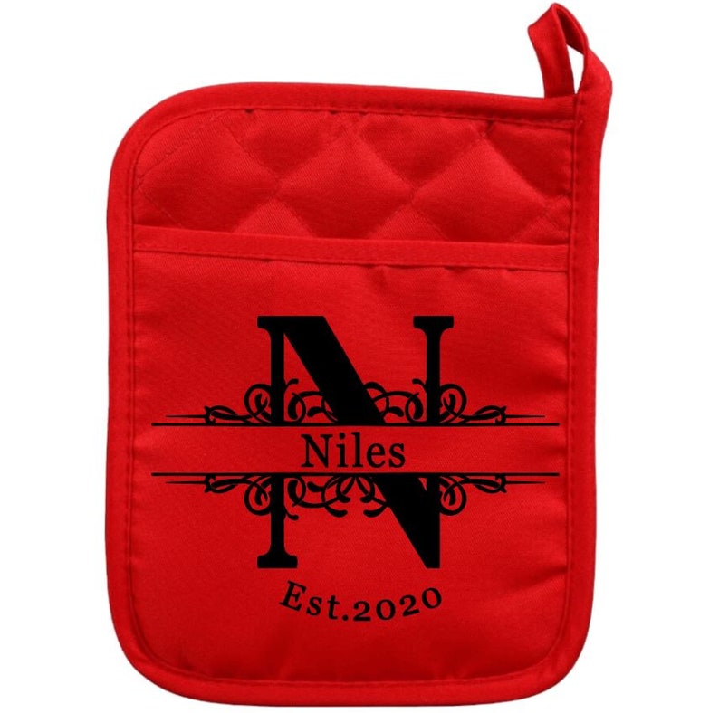 May include: Red quilted pot holder with a black letter N, the name Niles, and the text Est. 2020.