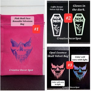 May include: Three different velvet bags with skull designs. The first bag is pink with a purple skull. The second bag is black with a white skull and the text "DEAD INSIDE". The third bag is black with a pink and blue iridescent skull. The text "Color will vary with light" is on the bag.