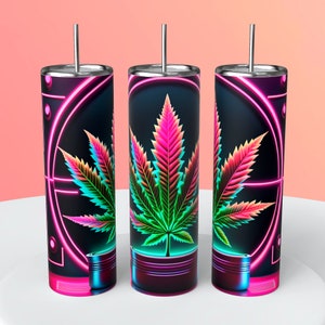 Könnte beinhalten: Drei Edelstahlbecher mit einem lebendigen Cannabisblatt-Design. Die Blätter wechseln von Grün zu Pink und Orange vor einem schwarzen Hintergrund, akzentuiert durch neonrosa und türkisfarbene Linien. Jeder Becher hat einen silbernen Strohhalm.
