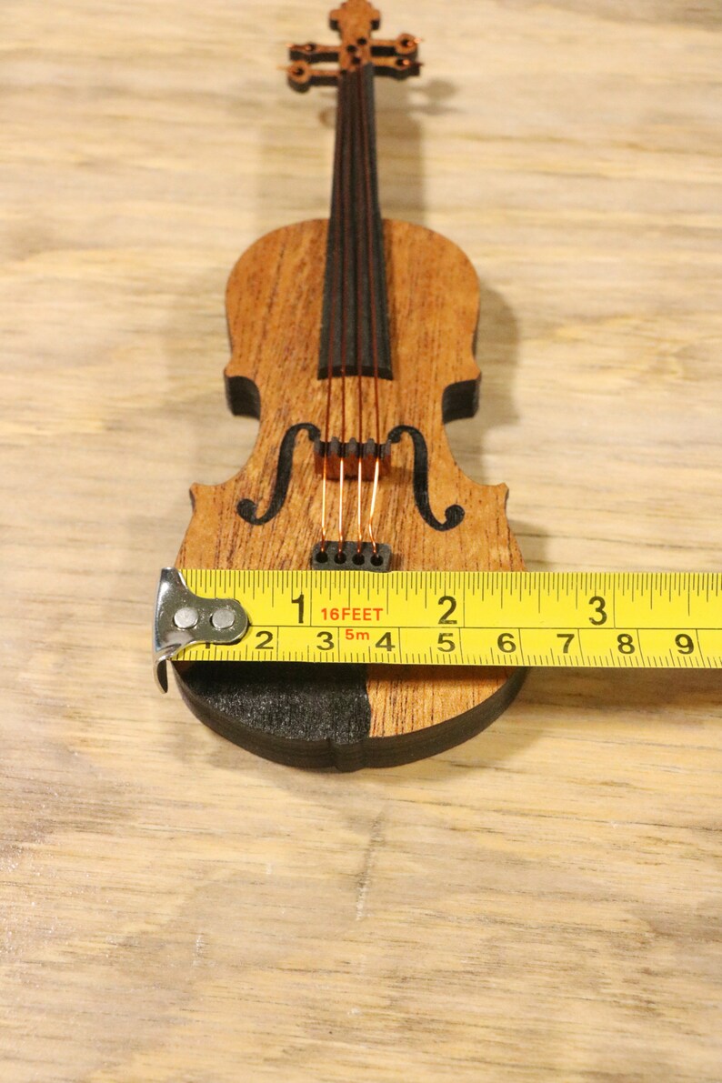 doll with violin
