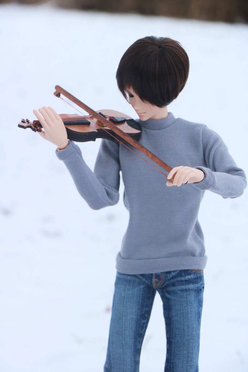 doll with violin