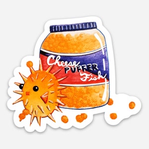 May include: A watercolor illustration of a jar of orange cheese puffs with the text "Cheese Puffer Fish" on the label. A cartoon pufferfish with orange spikes is next to the jar.