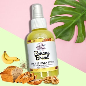 May include: A yellow spray bottle with a white cap and label that reads "Bovella's Radiance Banana Bread Body & Linen Spray Skin Safe | Alcohol Free | Sensitive Skin Friendly | 4 oz."