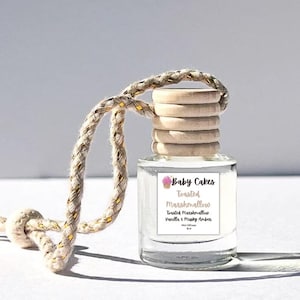 May include: A set of three ceramic mugs with a speckled, matte finish. The mugs are in shades of cream, light gray, and dark gray. Each mug has a simple, minimalist design, perfect for coffee or tea.