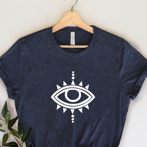 Evil Eye Graphic T-Shirt, Mystical Unisex Tee, Spiritual Protection Shirt, Boho Magic Top, Occult Aesthetic Gift, Witchy Graphic Tee