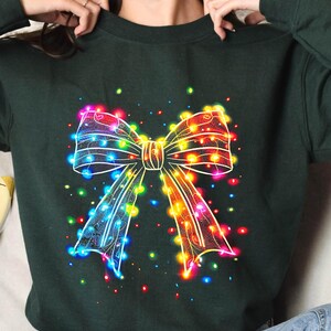Christmas Light Bow Sweatshirt: Holiday Coquette Style