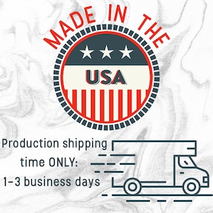 May include: A red, white and blue circular sticker with the text "MADE IN THE USA" and three stars. The sticker is on a white background with a grey marble pattern.