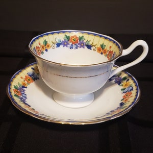 Royal Albert Crown China Teacup and Saucer  Pattern 7574 Vintage