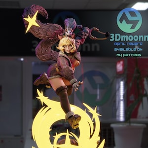 May include: A detailed figurine of a female character with blonde hair, wearing a brown and purple outfit, and posed dynamically. The figure is surrounded by a yellow energy effect and a star-shaped element. The base has the text "3Dmoonn" and "April reward available on my Patreon".