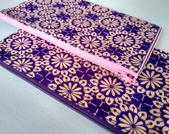 Small fabric purse/bag/organiser for make up, pens, pencils, travel medications. Lovely gift!