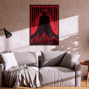 May include: A black and red poster with the word "Dracula" in white letters. The poster features a silhouette of a man in a cape standing in front of a red moon and a cityscape.