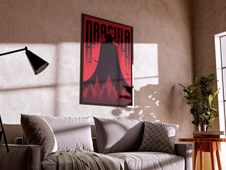 May include: A black and red poster with the word "Dracula" in white letters. The poster features a silhouette of a person in a cape standing in front of a red background with bats flying around them.